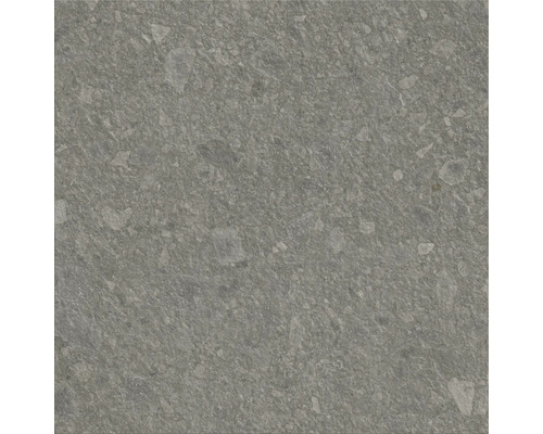 Detail šedej keramickej dlaždice so škvrnitou textúrou.