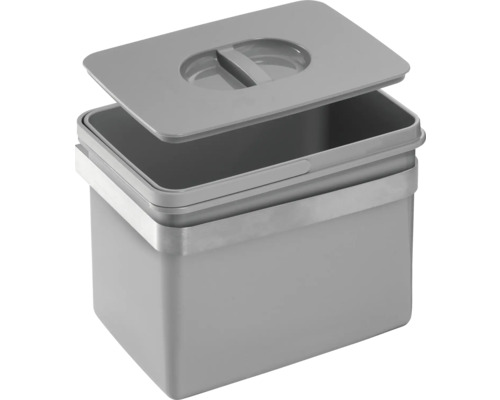 Sivá odpadková nádoba s čiastočne otvoreným vekom