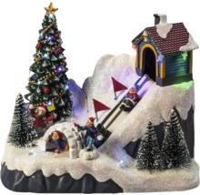 Vianočná miniatúrna dedina s vianočným stromčekom, iglu a sánkarskou dráhou