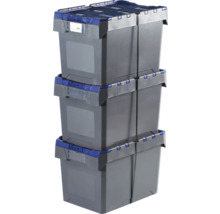 Tri sivé plastové úložné boxy, naskladané na sebe a upevnené popruhmi.