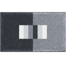 Koberec s geometrickým vzorom