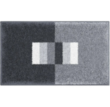 Koberec s geometrickým vzorom