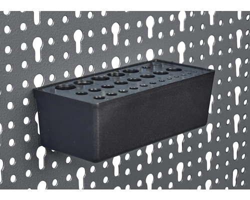 Držiak na náradie pre dierovanú stenu