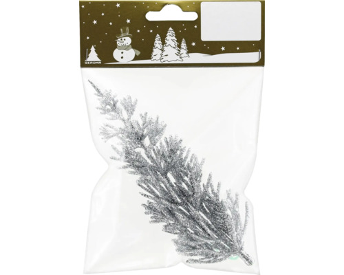 Trblietavá jedľová vetva v balení ako vianočná dekorácia