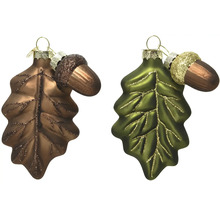 Dve ozdoby z dubových listov s trblietavými akcentmi na zavesenie