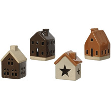 Štyri dekoratívne keramické domčeky na sviečky