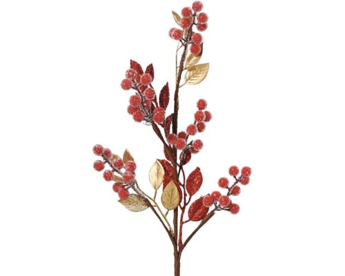 Dekoratívna vetva s červenými bobuľami a listami ako slávnostná dekorácia