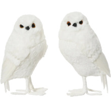 Dve biele sovie figúrky ako dekorácia