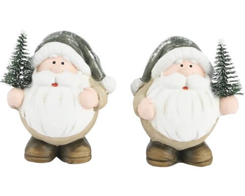 Dve figúrky Santa Clausa s malým vianočným stromčekom ako dekorácia