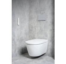 Závesné WC s ovládacím panelom v kúpeľni s betónovým vzhľadom.