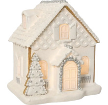 Dekoratívna medovníková chalúpka s vianočným stromčekom