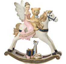 Dekoratívna figúrka s anjelom, medvedíkom a hojdacím koňom ako slávnostná dekorácia