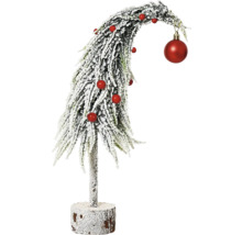 Dekoratívny, ohnutý vianočný stromček so snehom a vianočnými guľami ako slávnostná dekorácia