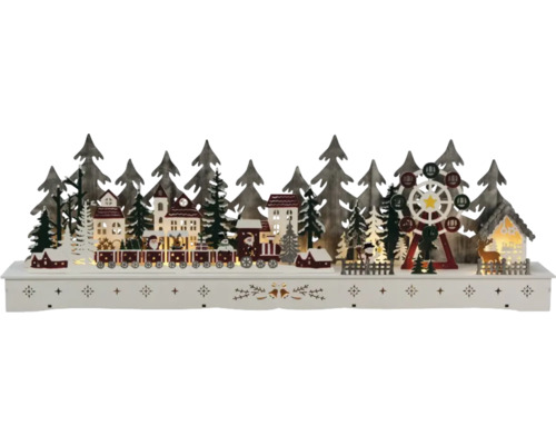 Dekoratívna drevená vianočná krajina s domami, stromami, železnicou a ruským kolom