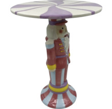 Dekoračný stolík v tvare luskáčika s pruhovanou doskou stola