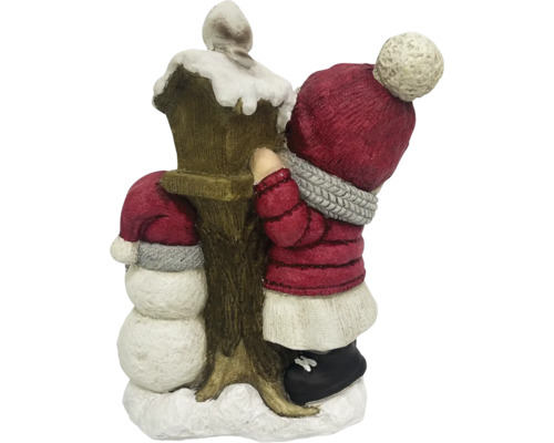 Dekoratívny vianočný kúsok so snehuliakom a dieťaťom pri lampáši