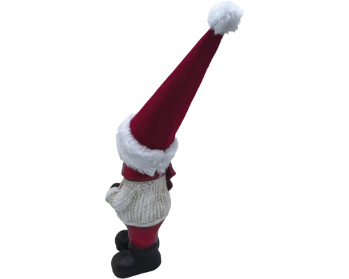 Vianočný škriatok s červenou čiapkou ako záhradná dekorácia