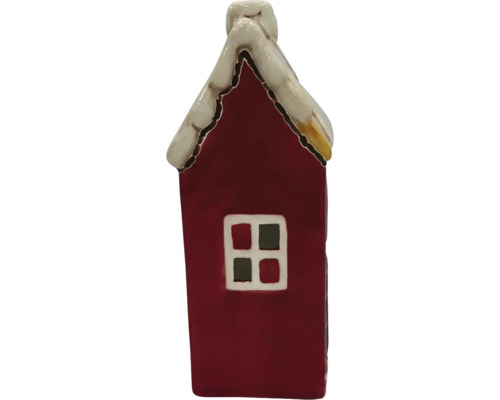 Dekoratívna figúrka domu so snehom na streche a oknom