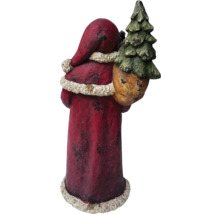 Figúrka Santa Clausa so stromom vo vreci