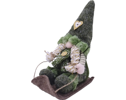 Dekoratívna figúrka ako škriatok na saniach s aplikáciou srdca na čiapke