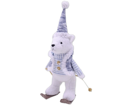 Dekoratívny plyšový medveď s čiapkou a lyžami ako vianočná dekorácia