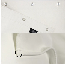 Detailný pohľad na nepriehľadnú látku s očkami a logom Burschberg