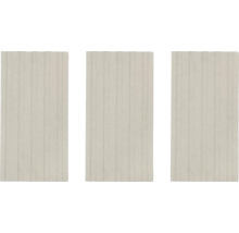 Tri svetlé betónové dosky s ryhovaným povrchom