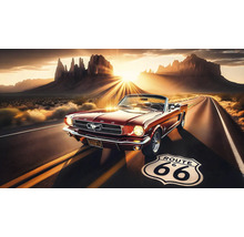 Červený veterán na ceste Route 66 s horskou scenériou v pozadí