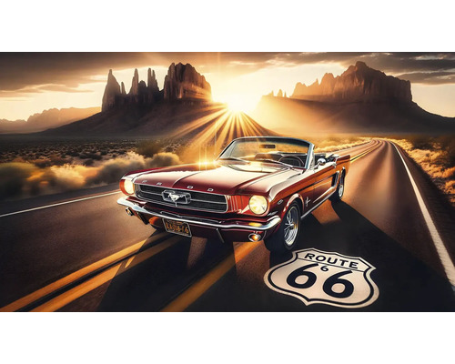 Červený veterán na ceste Route 66 s horskou scenériou v pozadí