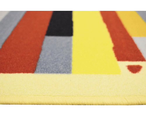 Detailný pohľad na koberec s geometrickým vzorom