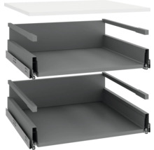 Dve sivé zásuvkové vložky s výsuvnými lištami a biela stolová doska.