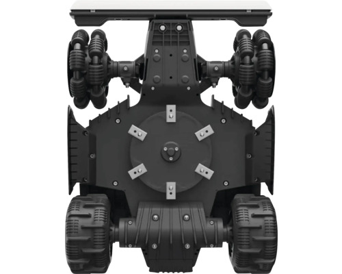 Detailný záber robotickej kosačky s funkciou mulčovania a špeciálnymi kolesami pre presné kosenie