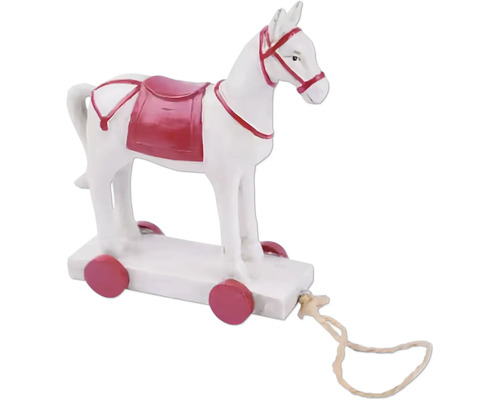 Biely drevený kôň na kolieskach s ťažným lanom ako dekorácia