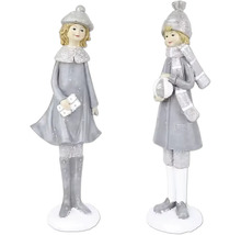 Dve dekoratívne zimné figúrky s čiapkou a kabátom