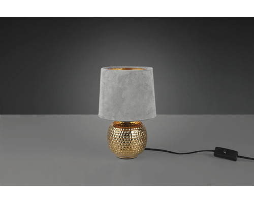 Dekoratívna stolná lampa s tienidlom a zlatavou základňou