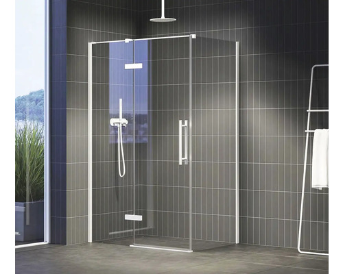 Rohová sprcha so sklenenými stenami a batériou v kúpeľni