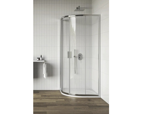 Rohová sprchová kabína v kúpeľni s bielymi obkladmi