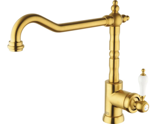 Zlatá kuchynská batéria s klasickým dizajnom a bielou rukoväťou