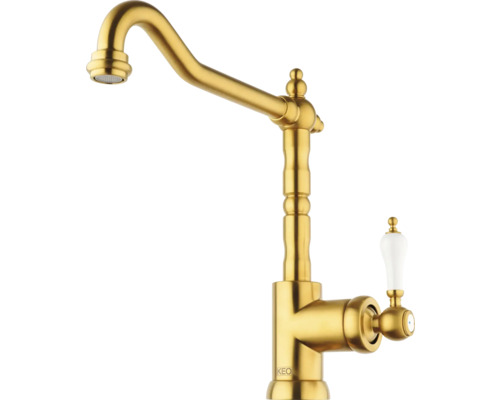 Zlatá kuchynská batéria s porcelánovou rukoväťou