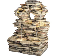 Dekoratívna izbová fontána vzhľadu kameňa s vodnou hrou a osvetlením.