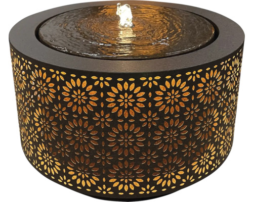 Dekoratívna izbová fontána s kvetinovým vzorom a vodnou hrou