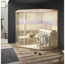 Moderná sauna so sklenenou prednou stenou, drevenými lavicami a kachlami v interiéri