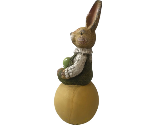 Veľkonočný zajačik sediaci na guli