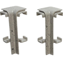 Dva rohové konektory z plastu pre okraje trávnika