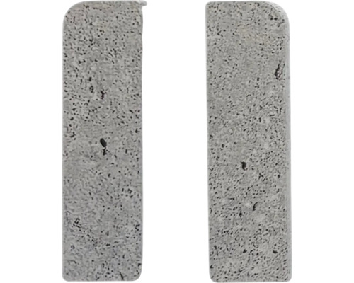 Dva betónové dlažobné kamene