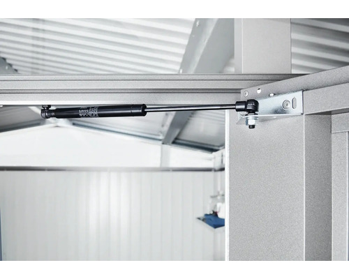 Detailný záber plynovej vzpery na kovovom ráme