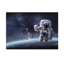 Fototapeta s astronautom vo vesmíre