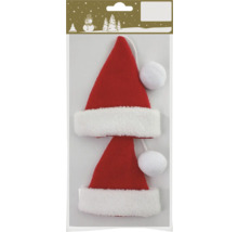 Dve červené čiapky Santa Clausa s bielym lemom a brmbolcom ako ozdoba na vianočný stromček