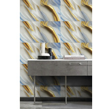 Obkladové dlaždice s abstraktným vzorom v zlatej a modrej farbe za umývadlom