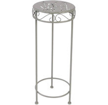 Stojan na kvety z kovu so vzorom na doske stola